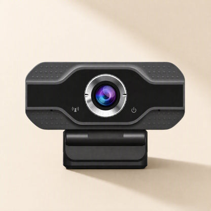 Camclear USB Webcam – front view of the webcam showing the round lens, textured grip panels, microphone icon and power button