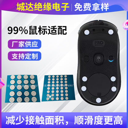 Puckdot Mouse Feet PTFE glide dots on blue sheets beside the underside of a black wireless mouse with dots applied