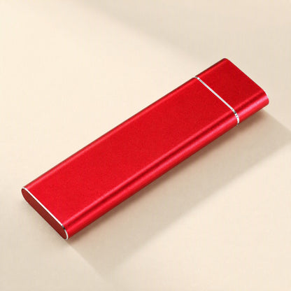 Solidrive Portable SSD – red anodized aluminum portable SSD with silver accent lines, seen from above on a beige background