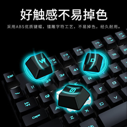 Keybrid – Close-up of W, D and S keycaps lit in cyan, with the top-left keys of the black keyboard behind