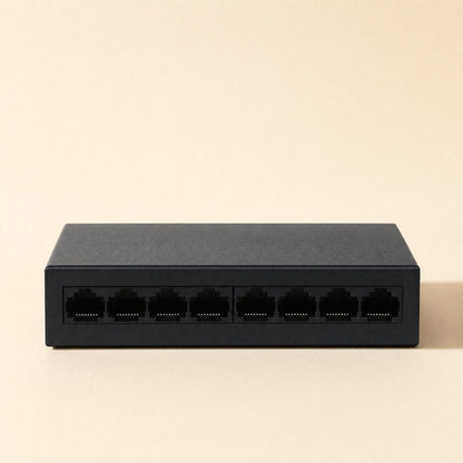 Gigaflow Gigabit Ethernet Network Switch – front view of the black eight-port switch showing two groups of four RJ45 ports
