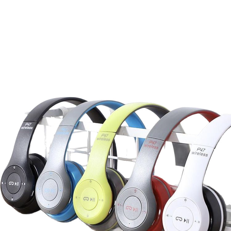Foldtune – Row of foldable wireless headphones in black, blue, lime green, red and gray, and white hanging on a rack