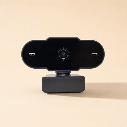 Weblens Computer USB Webcam – front view of the black webcam with the central lens ringed by dots and a slot on each side