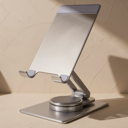 Turnstand – Front view of the stand's flat silver tablet rest with grip lips, on a rotating round base