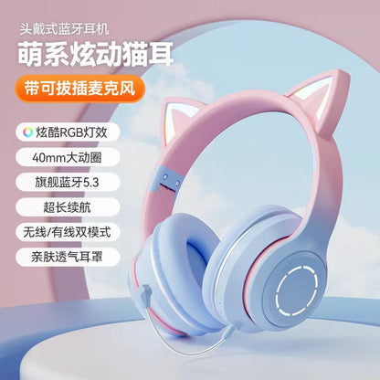 Glowmuse – Blue and pink cat ear headset with pop-up feature labels in Chinese and a boom mic, on a round pedestal