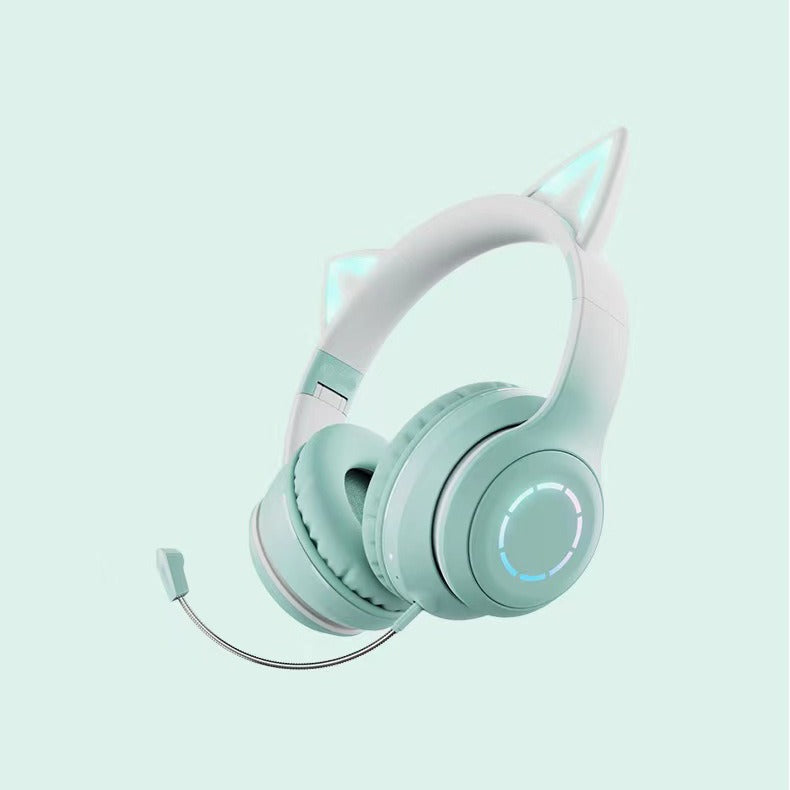 Glowmuse – Mint green and white cat ear headset with glowing blue ring light and boom mic, on a pale green background