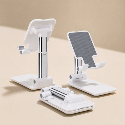 Pocketprop – White stand with silver telescoping arm, shown folded flat and extended on a beige surface