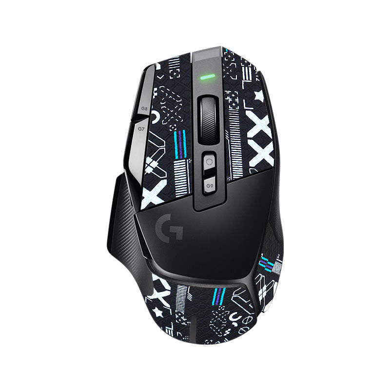 Gripscale – Top view of black mouse with black-and-white geometric grip stickers and green LED