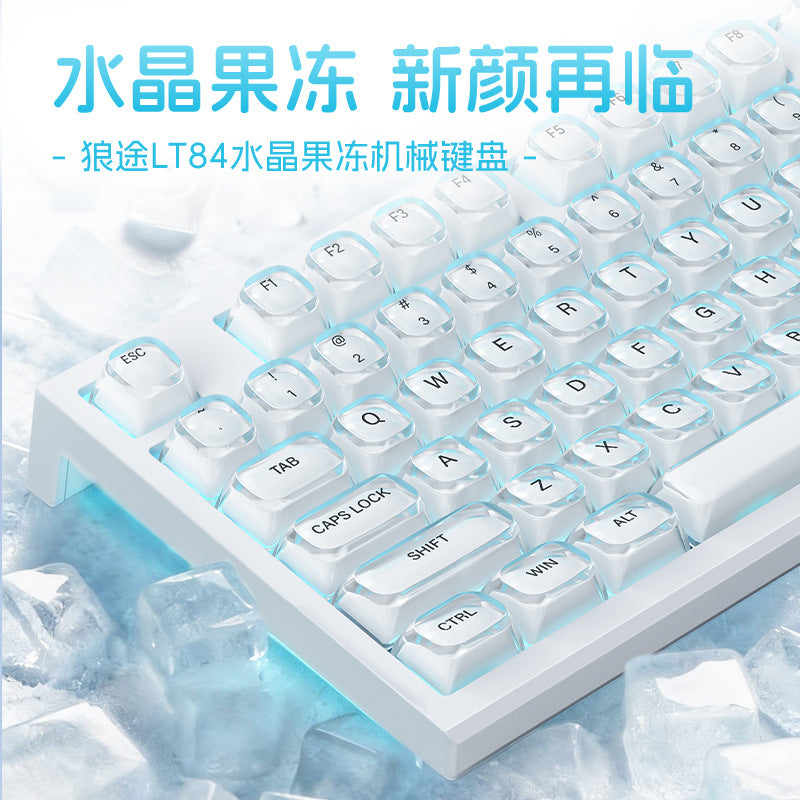 Keystream – Close-up of clear white crystal jelly keycaps on the left side, resting among ice cubes