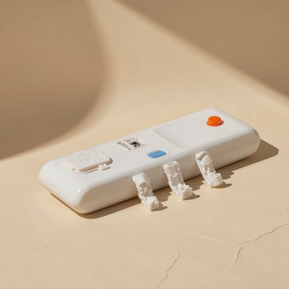 Stickloop self-adhesive plastic cable organizer: white oblong case with an orange button and three small clips