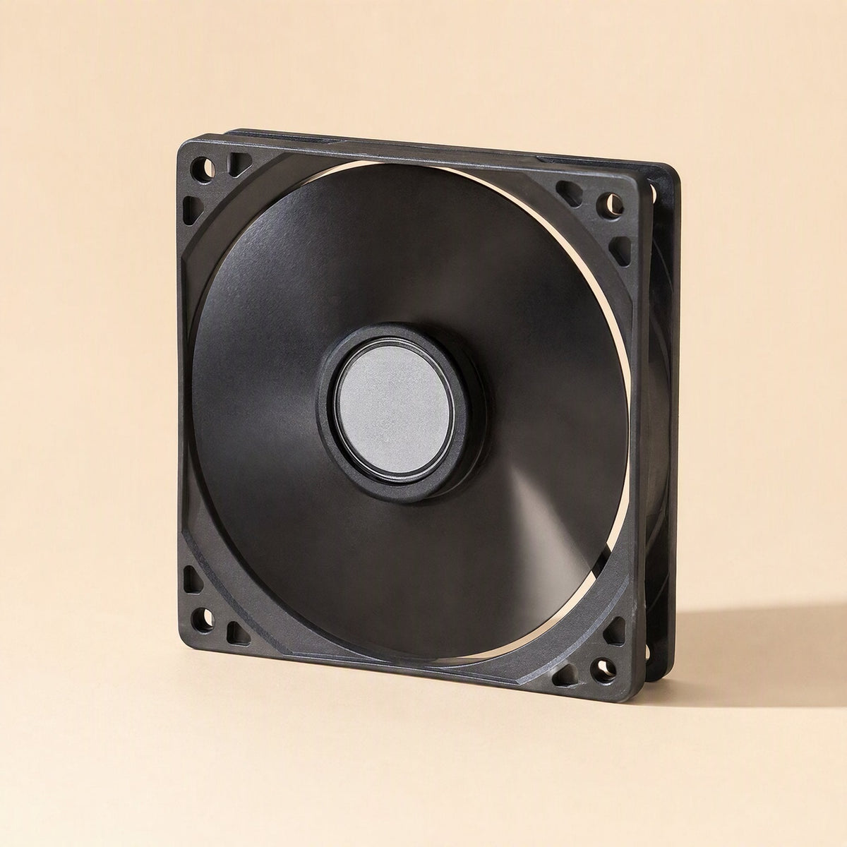Deskwhirl – Black 12cm fan seen from the back with a smooth solid hub and square frame with mounting holes