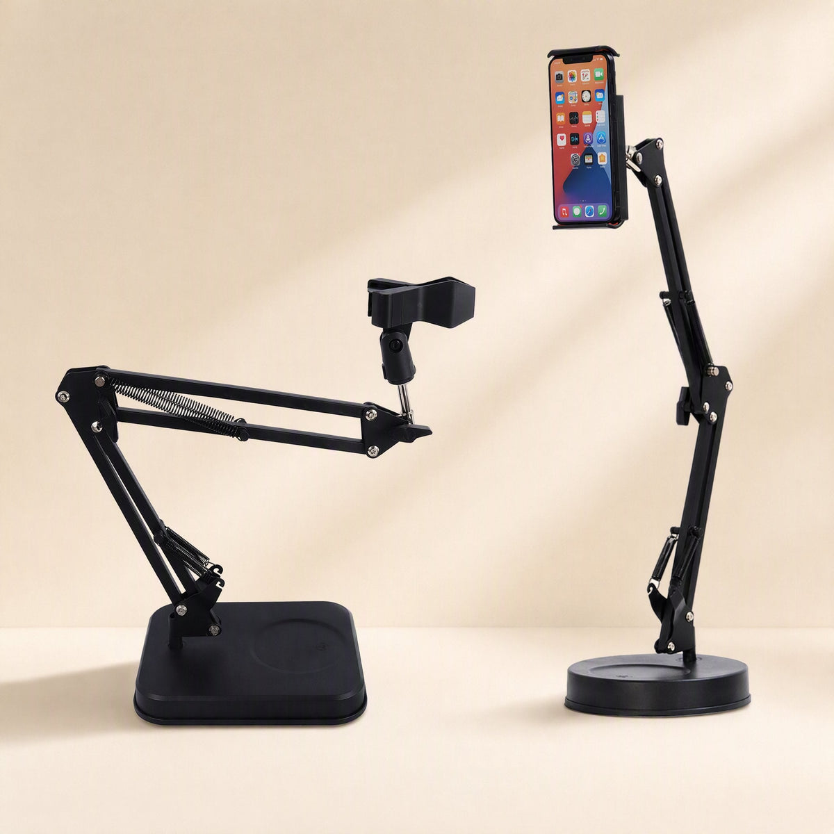 Phonebrace alloy desktop phone bracket in two versions: a mic-clip arm on a square base and a phone arm on a round base