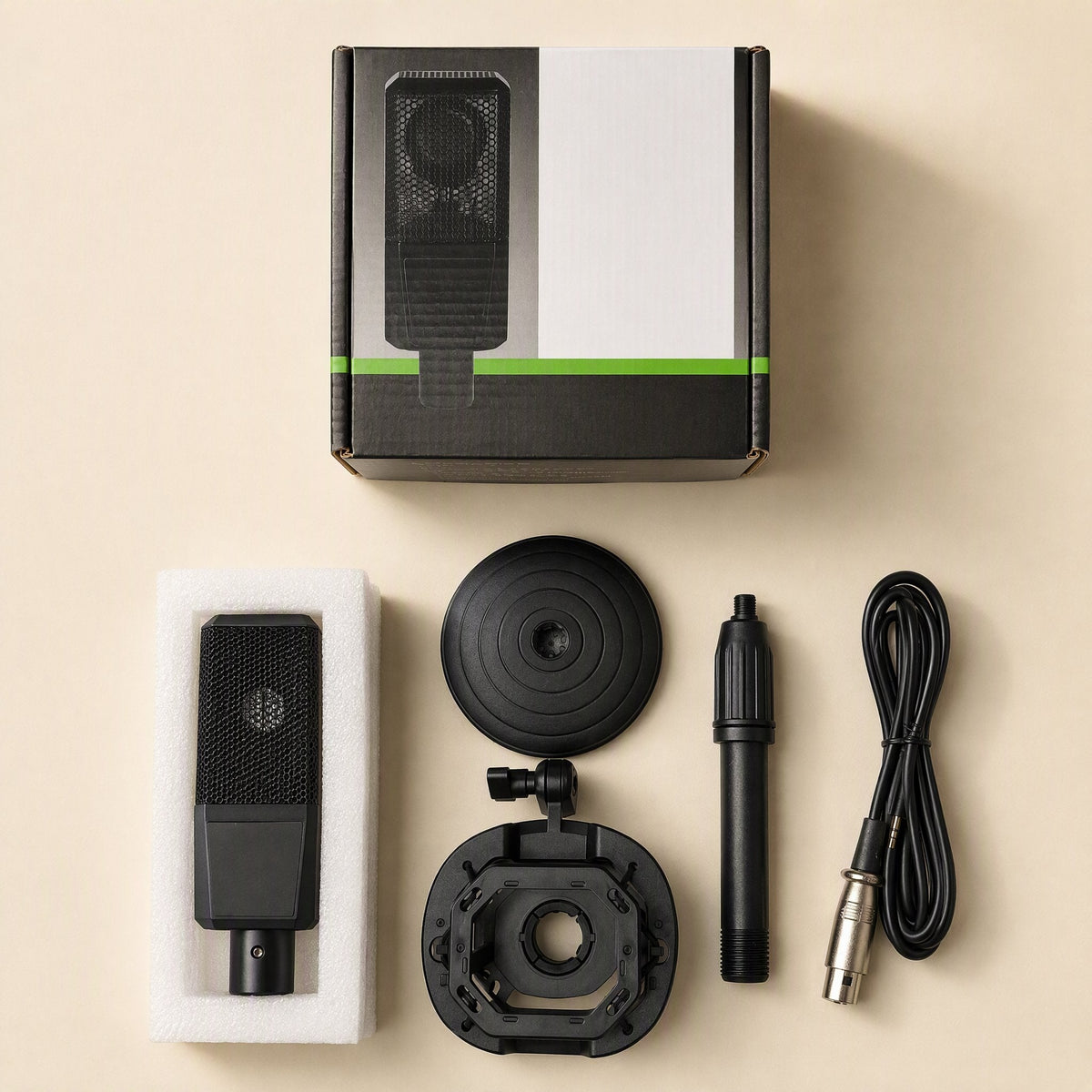 Tonecapture – Open retail box above microphone in foam, desktop stand base, shock mount, stem and XLR cable laid flat