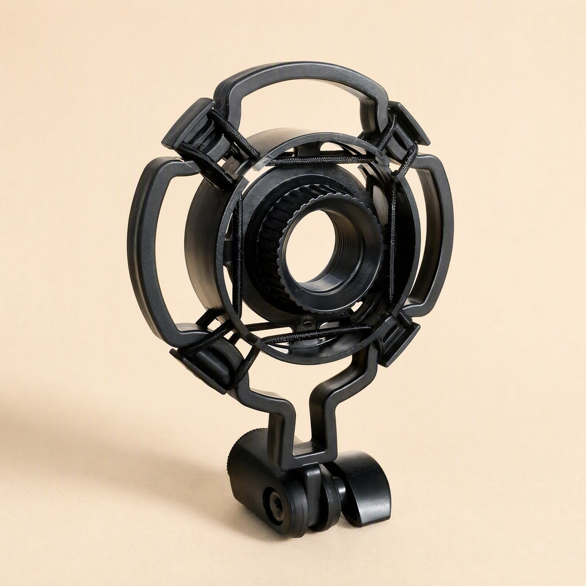 Shockgrip – Black ring-shaped mount with a threaded center and four outer arms, angled view