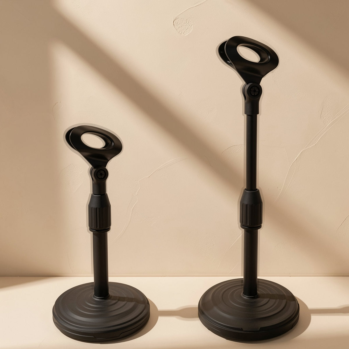 Deskrest Desktop Microphone Stand – two telescopic stands with wired mic clips set at short and tall heights, side by side