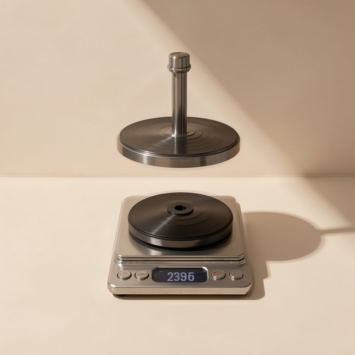 Deskrest Desktop Microphone Stand – round weighted metal base of the stand beside a digital scale showing its weight
