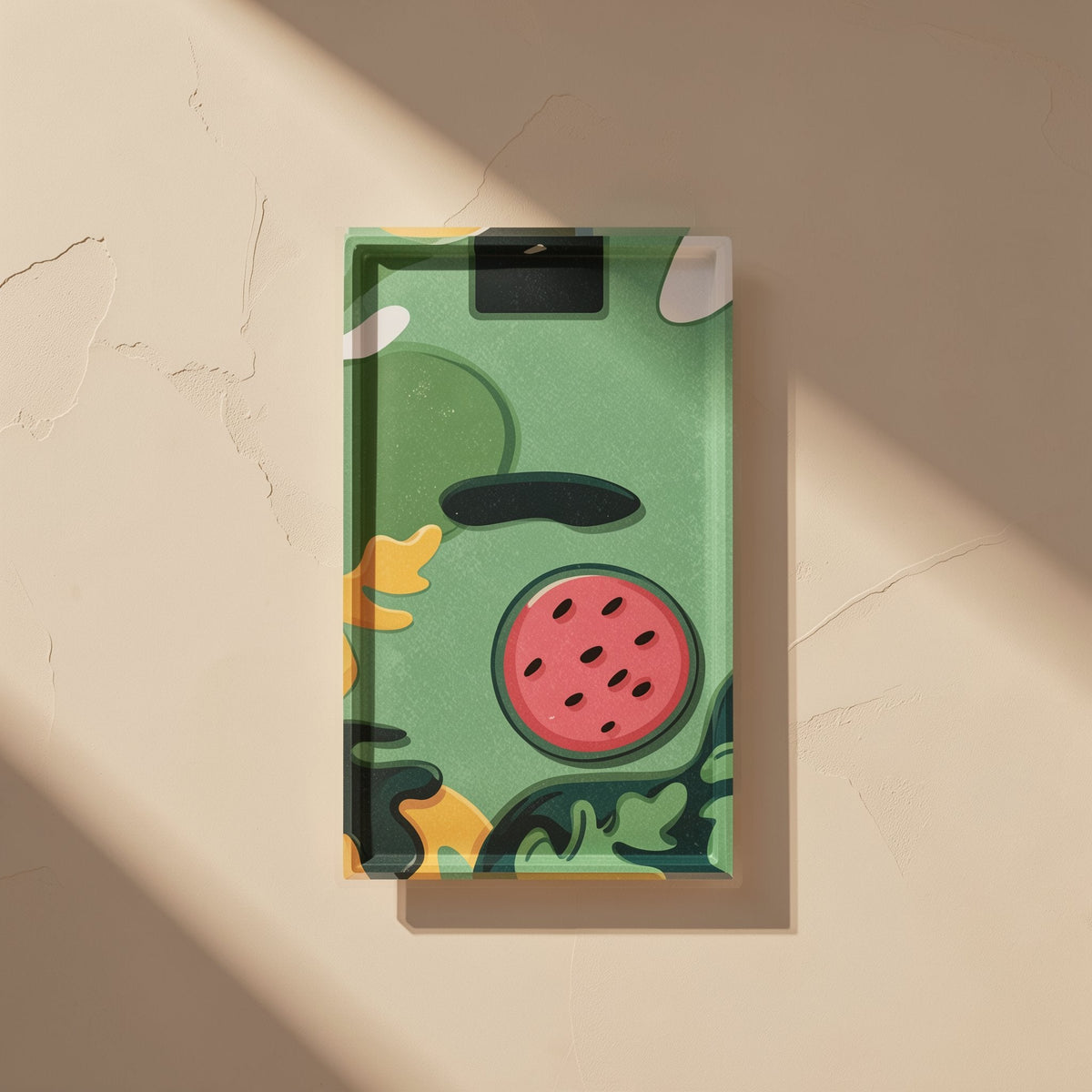 Chillchip Mobile Phone Cooling Stickers box with green watermelon illustration on a beige wall