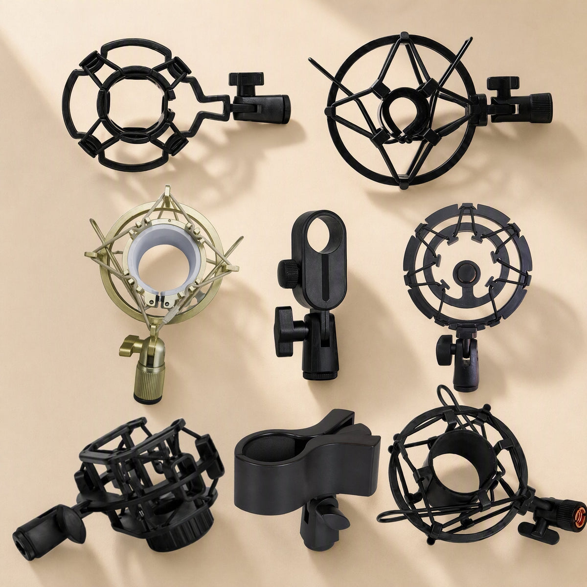 Calmstand Microphone Shock Mount Stand in eight styles, black, gold and metal, arranged on a beige backdrop