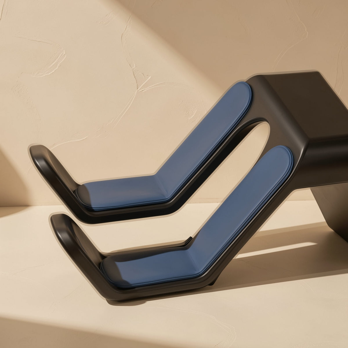 Padperch ABS Game Controller Stand – close-up of black stand with blue cushioned arms, angled against a beige wall