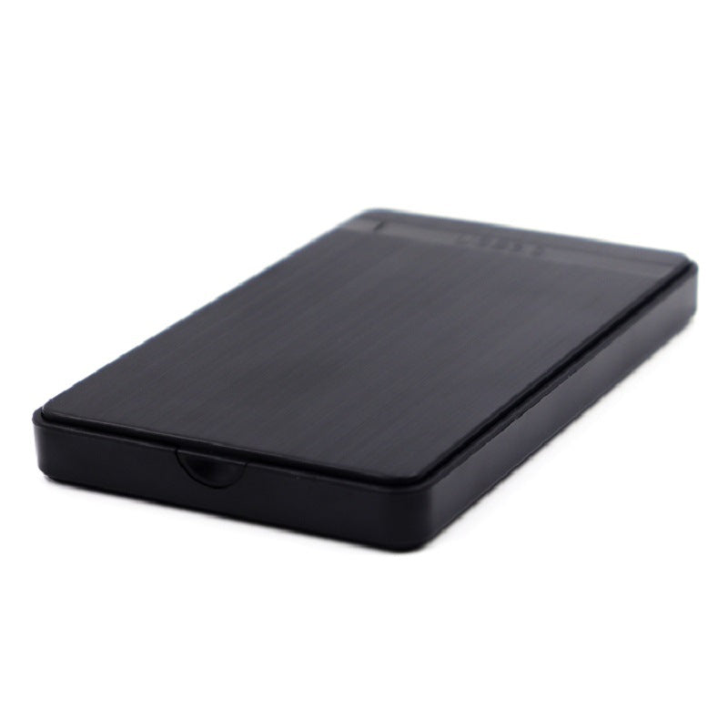 Driveshell – Slim black enclosure lying flat, showing the low side profile and the seam where the case opens