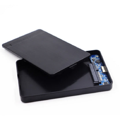 Driveshell – Open enclosure with the lid lifted off, showing the blue circuit board and SATA connector inside