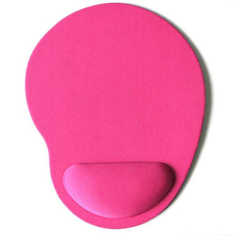 Wristhold Gaming Wrist Rest Mouse Pad – pink oval mouse pad with a raised wrist support cushion, shown from above