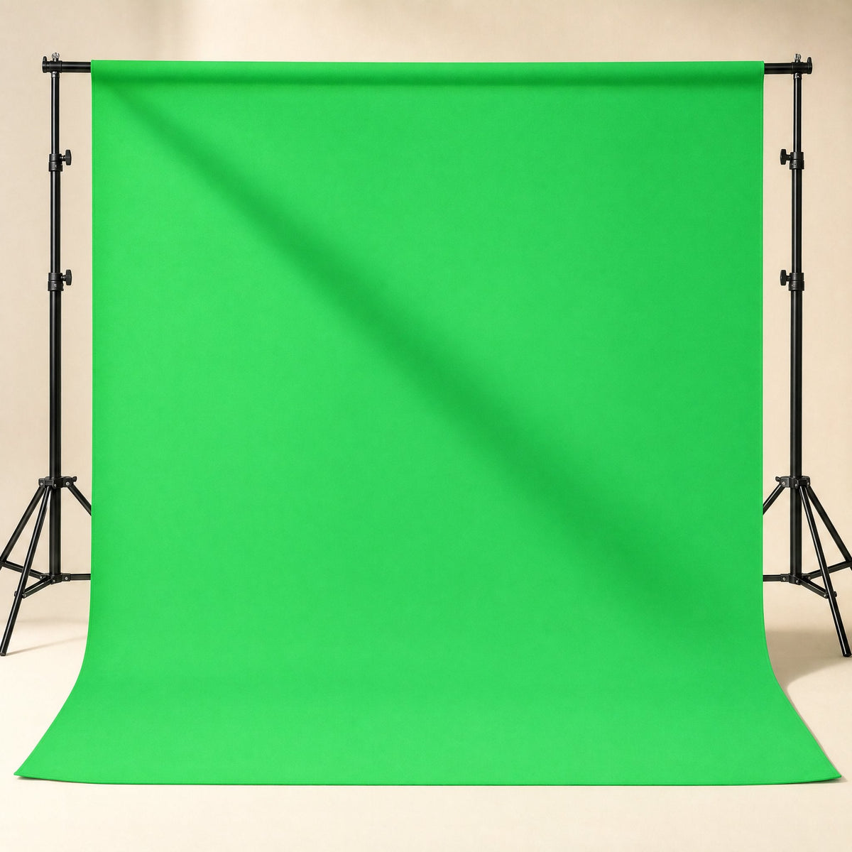 Screenweave Green Screen Background Cloth hanging from a stand with tripods on a cream background