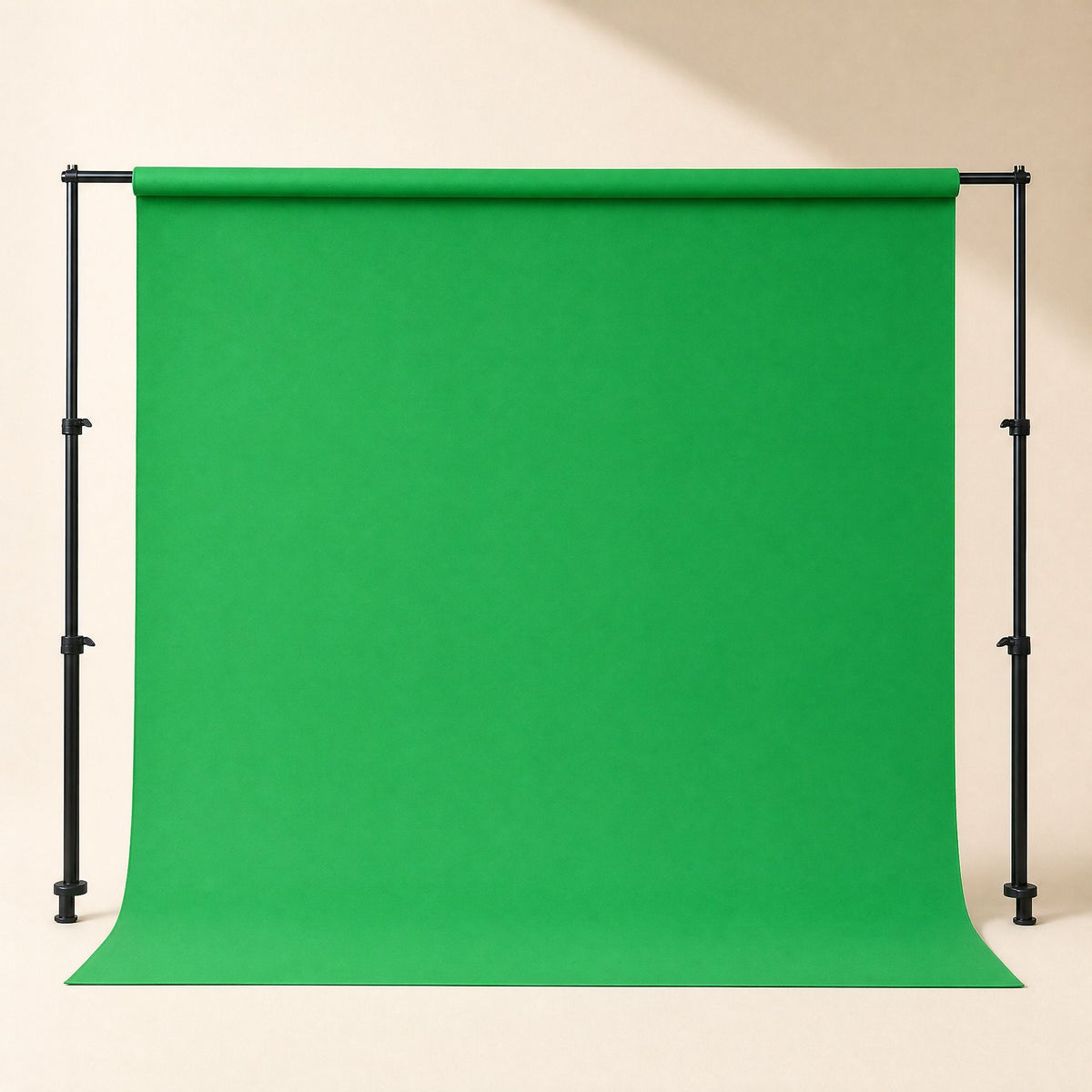 Screenweave – Green backdrop hung on a wide stand with black poles, falling to the floor in a clean, even sheet