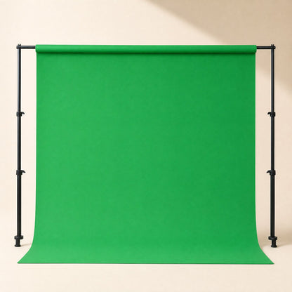 Screenweave – Green backdrop hung on a wide stand with black poles, falling to the floor in a clean, even sheet