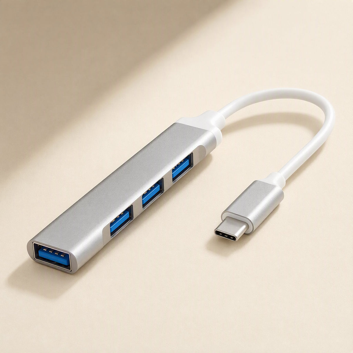 Metalbay Aluminum Alloy USB Hub Docking Station in silver with four blue USB ports and a white USB-C cable