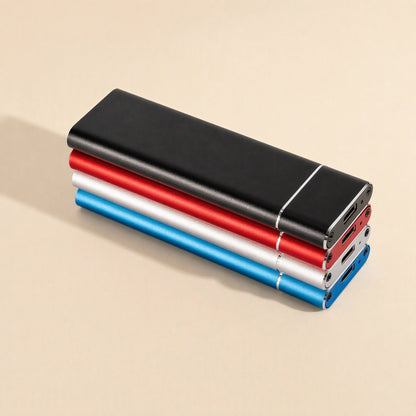 Bytecove – Stack of four M.2 SSD enclosures in black, red, silver and blue with USB-C ports facing forward