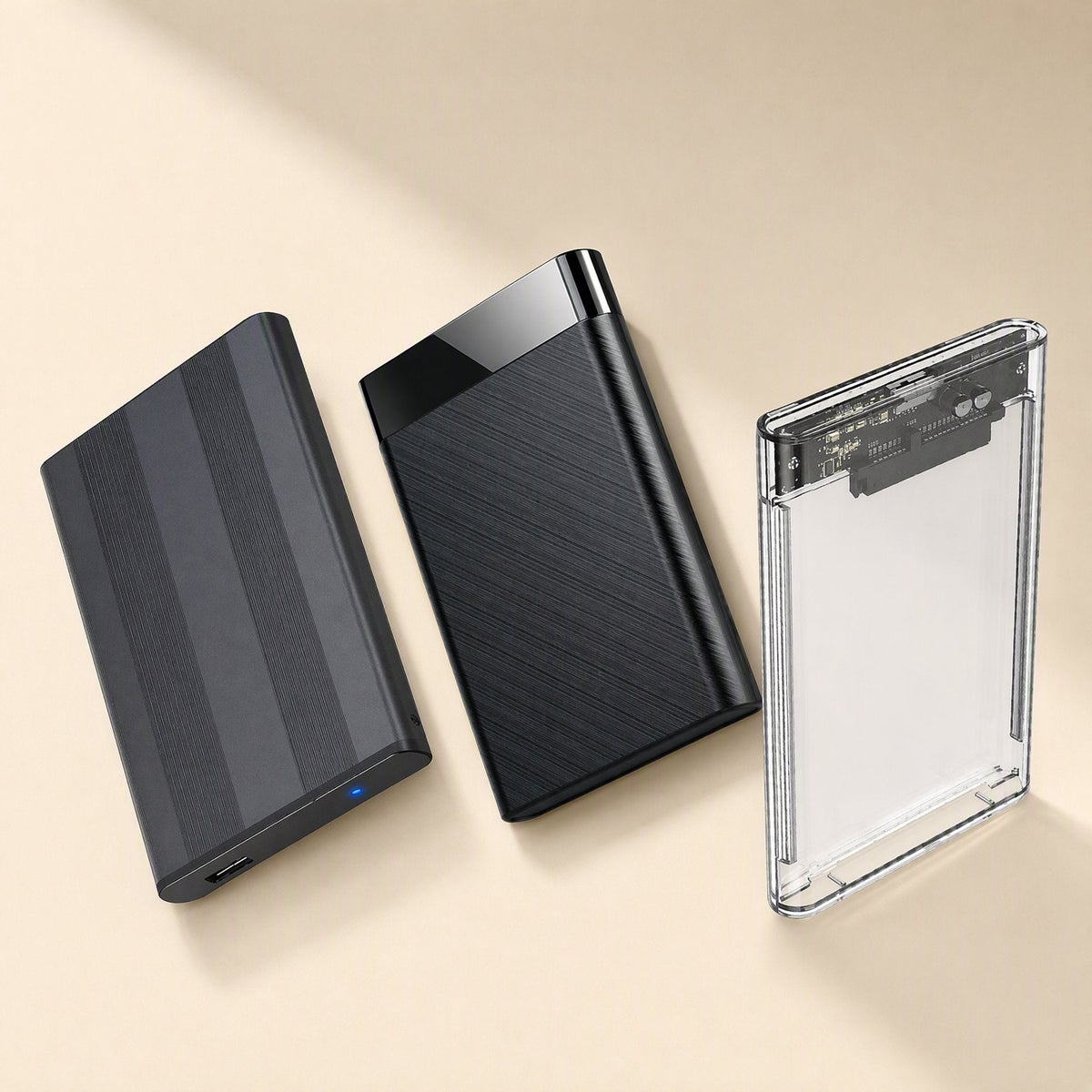 Flexshell 2.5-Inch PVC Hard Drive Enclosure in three styles: striped black, brushed black and clear