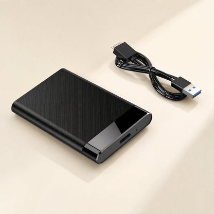 Flexshell – Black brushed-finish enclosure with a glossy end panel beside a coiled USB cable with Micro-B plug
