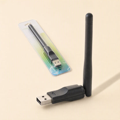 Signalstem USB Wireless Network Card with antenna upright beside its retail blister packaging on a cream backdrop