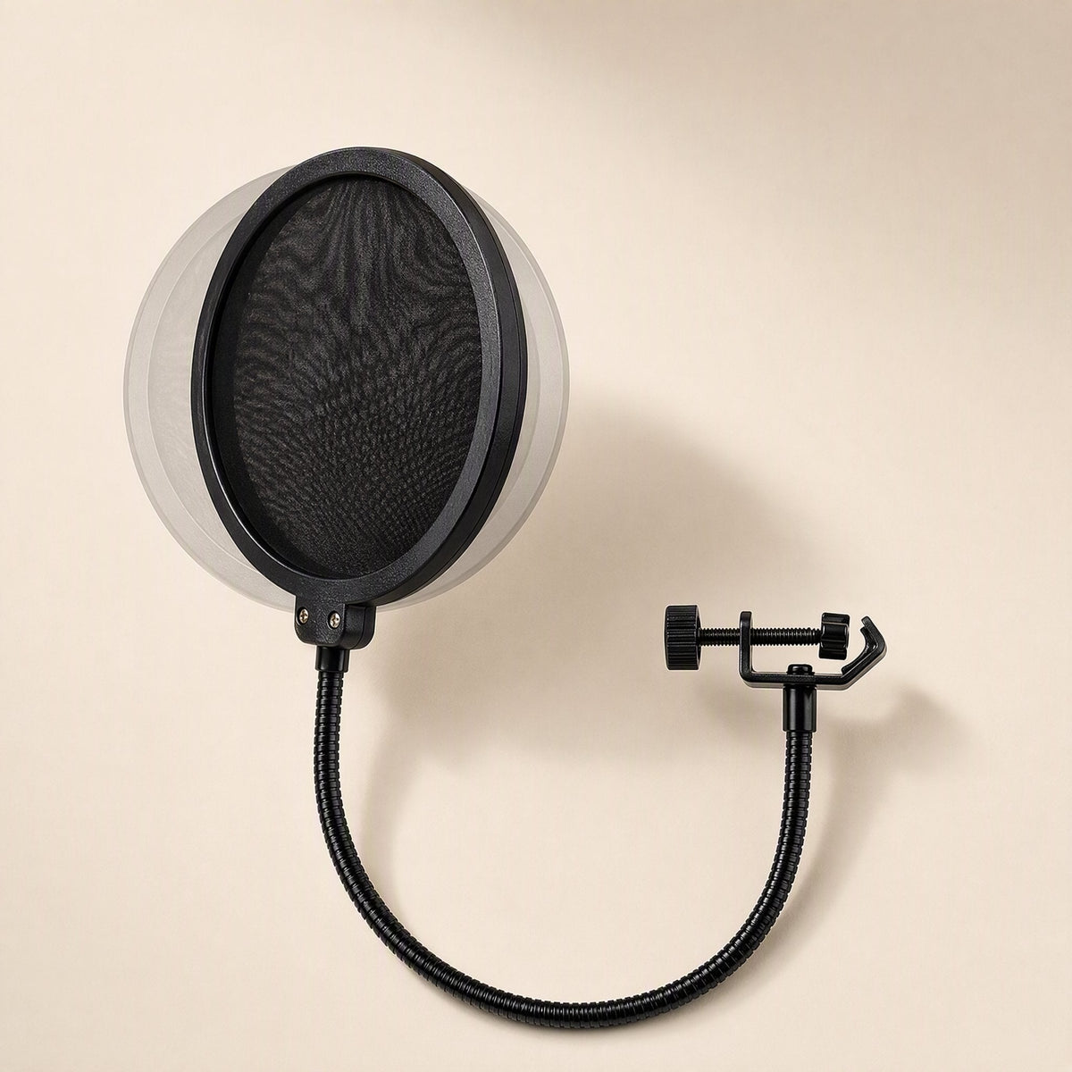 Windveil – Black round pop filter with gooseneck arm and C-clamp, shown with a ghosted double-layer screen behind the mesh
