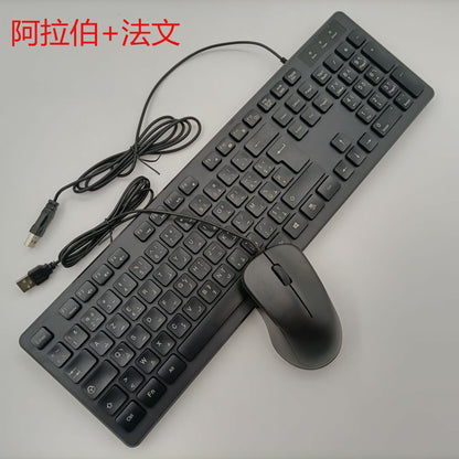 Deskcord – Black wired keyboard and mouse with Arabic and French key legends, two USB cables on a light surface