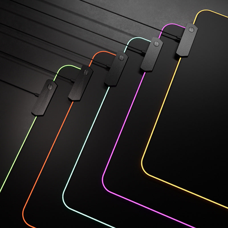 Glowmat RGB Luminous Gaming Mouse Pad corners in green, orange, mint, pink and yellow glowing edges