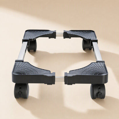 Rollstand – Front view of the black stand's adjustable metal side rails and corner pads, with wheels at each corner