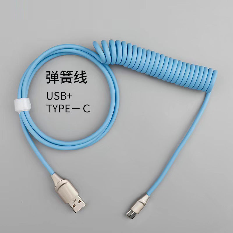 Cablecraft – Light blue coiled spring cable with USB-A plug and Type-C connector, bundled with a white strap