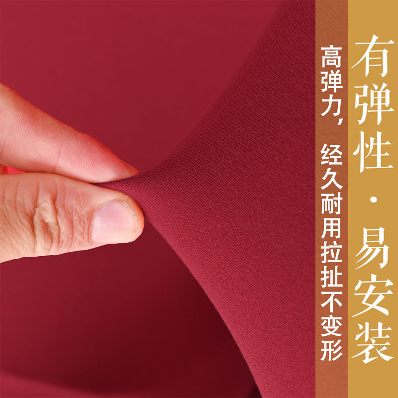 Drapelet Polyester Gaming Chair Cover Set – close-up of a hand stretching red stretch fabric of the cover set