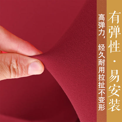 Drapelet Polyester Gaming Chair Cover Set – close-up of a hand stretching red stretch fabric of the cover set