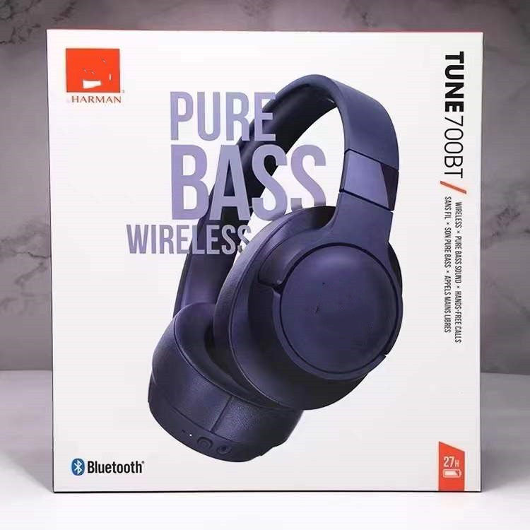 Voxhelm – Navy blue wireless headset in its retail box, front view with Pure Bass Wireless lettering