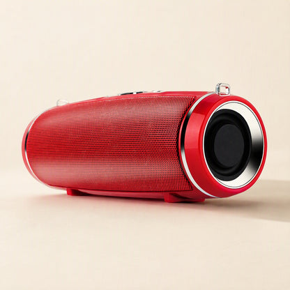 Strapsonic – Red speaker seen low from the side, with mesh grille, chrome ring and rubber feet along the base