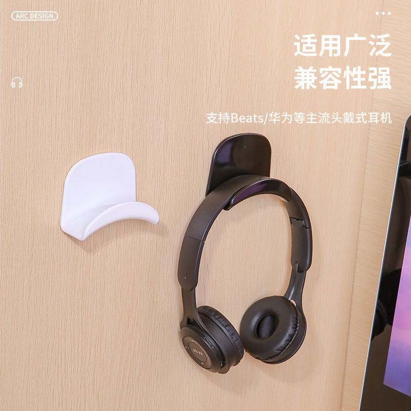 Hooksound – White and black hooks on a wood wall, one holding black headphones, with Chinese text about compatibility