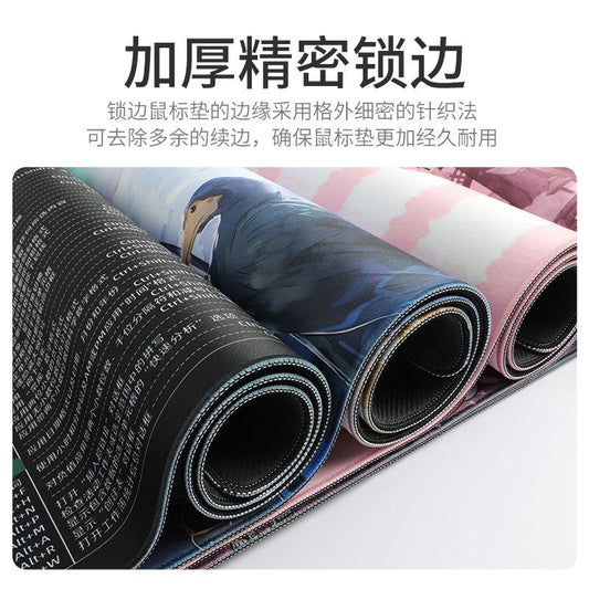 Broadmat – Rolled desk mats with printed designs, showing the stitched locked edges and black rubber backing