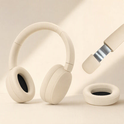 Hushsound – Cream over-ear headphones with detachable ear cushion and extended metal headband slider shown beside them