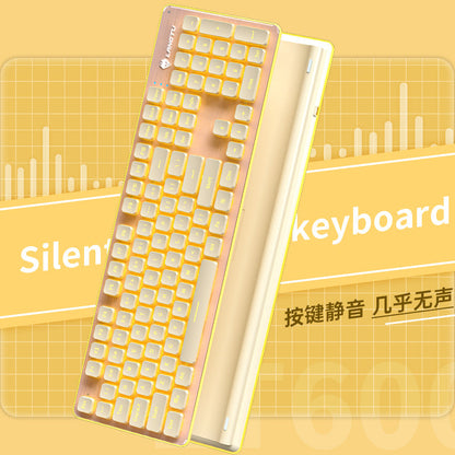 Clacknest – Cream and yellow backlit keyboard with a wrist rest, angled view with silent keyboard banner