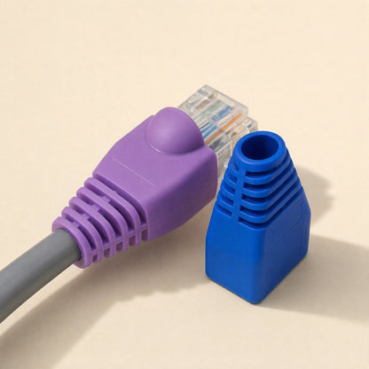 Plugcloak – Purple boot on a grey cable's RJ45 plug beside a loose blue boot showing its open cable end
