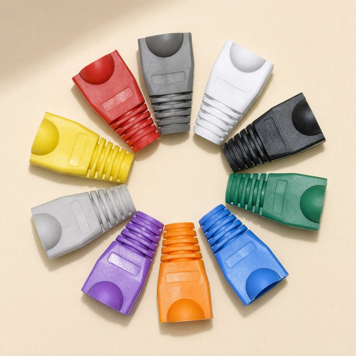 Plugcloak – Ten coloured RJ45 boots in a ring: red, grey, white, black, green, blue, orange, purple, light grey, yellow