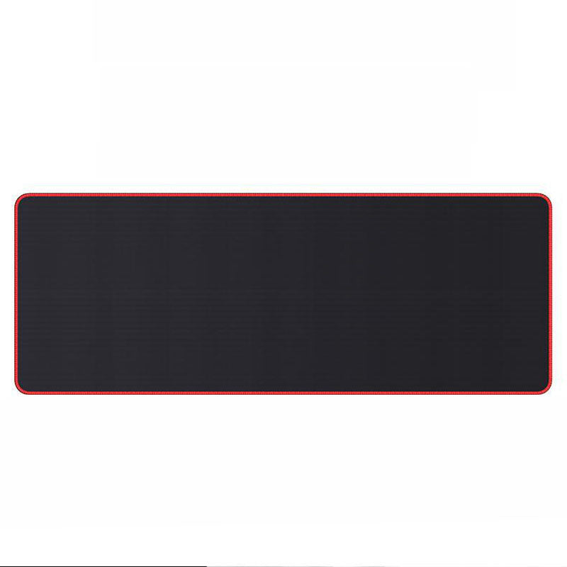 Rubberglide – Extra-long black desk mat with red stitched edge, shown flat from above on a white background